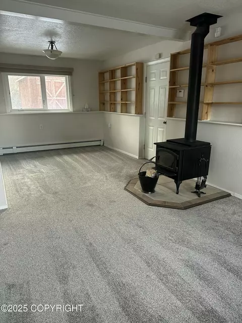 Living - 18028 Teklanika Dr, Eagle River, AK 99577 photo 5 of 5