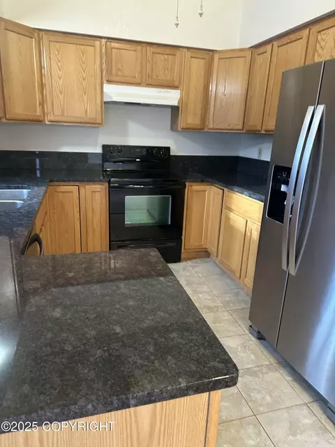 Kitchen - 18028 Teklanika Dr, Eagle River, AK 99577 photo 1 of 2