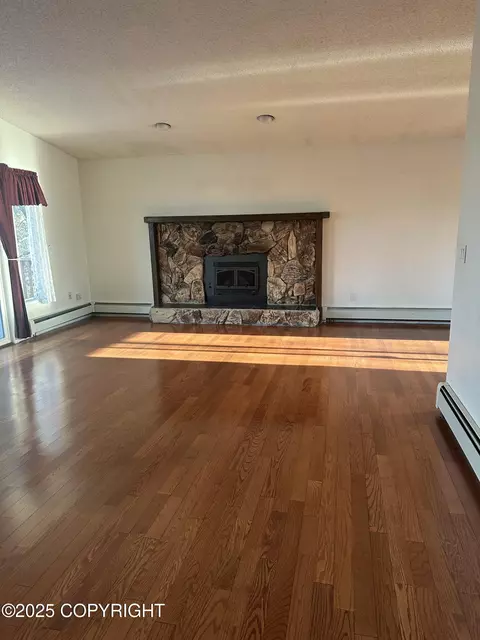 Living - 18028 Teklanika Dr, Eagle River, AK 99577 photo 3 of 5