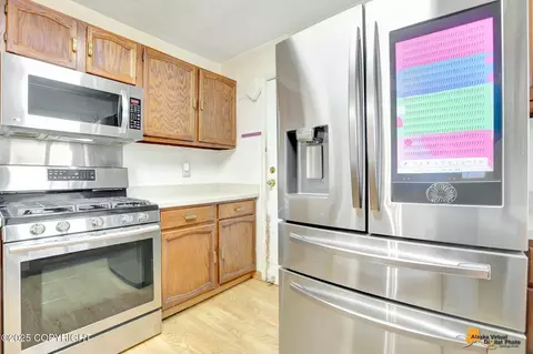 Kitchen - 7770 Lotus Dr, Anchorage, AK 99502 photo 1 of 3