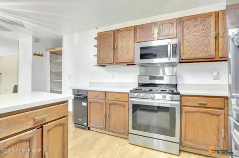 Kitchen - 7770 Lotus Dr, Anchorage, AK 99502 photo 2 of 3