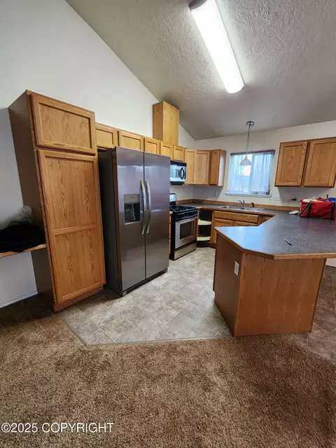 Kitchen - 11872 Galloway Loop # 35, Eagle River, AK 99577 photo 2 of 3