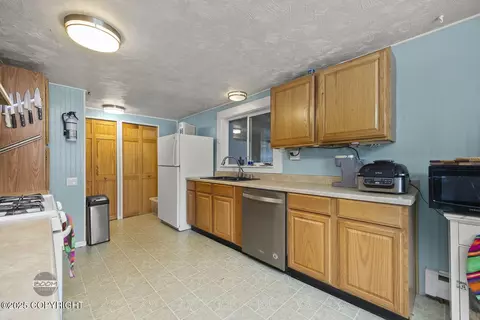 Kitchen - 4107 Harrison St, Anchorage, AK 99503 photo 1 of 4