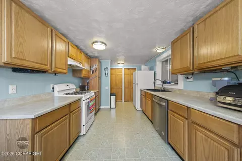 Kitchen - 4107 Harrison St, Anchorage, AK 99503 photo 2 of 4