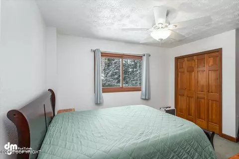Bedroom - 19501 Wingham Cir, Eagle River, AK 99577 photo 7 of 9