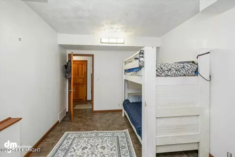 Bedroom - 19501 Wingham Cir, Eagle River, AK 99577 photo 6 of 9