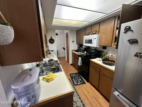 Kitchen - 2221 E 66th Ave, Anchorage, AK 99507 photo 2 of 2