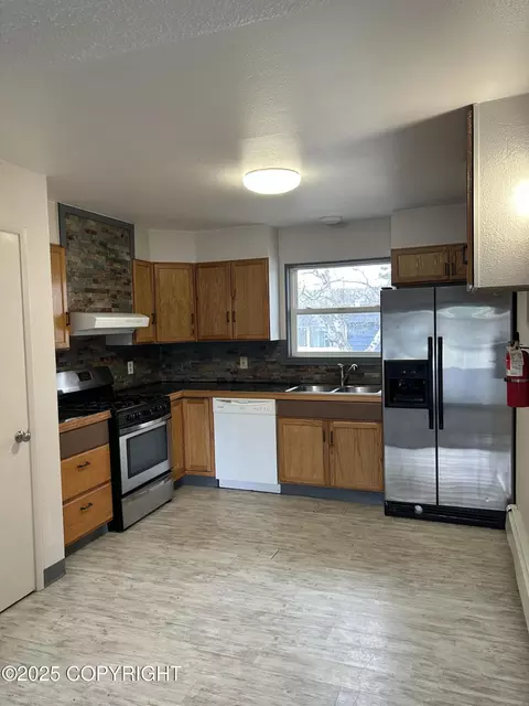 Kitchen - 3940 E 9th Ave, Anchorage, AK 99508 photo 1 of 1