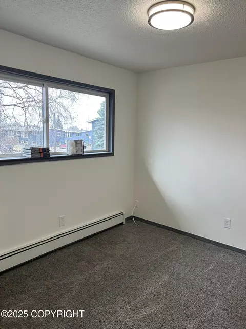 Bedroom - 3940 E 9th Ave, Anchorage, AK 99508 photo 3 of 3