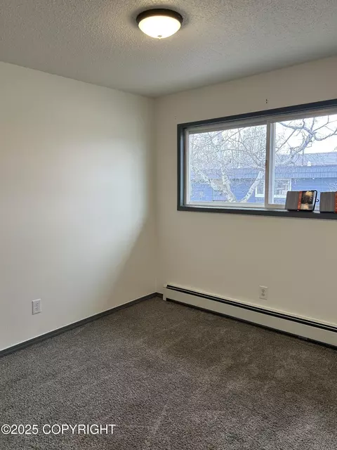 Bedroom - 3940 E 9th Ave, Anchorage, AK 99508 photo 2 of 3
