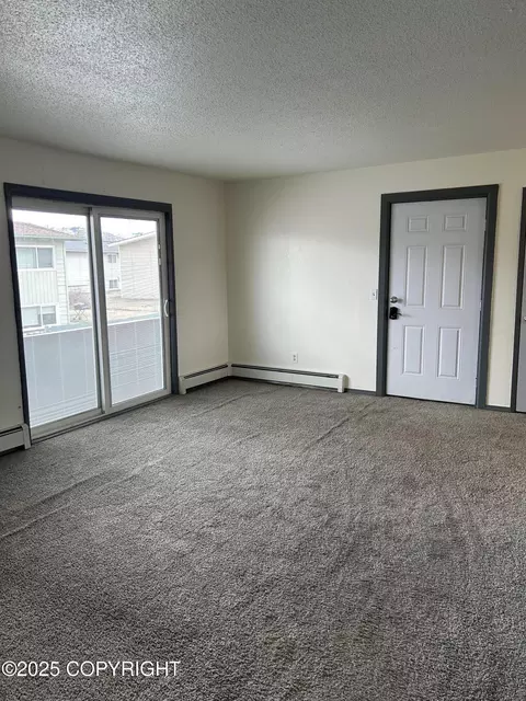 Living - 3940 E 9th Ave, Anchorage, AK 99508 photo 2 of 2