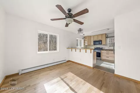 Living - 7300 Waterfall Dr, Eagle River, AK 99577 photo 3 of 7