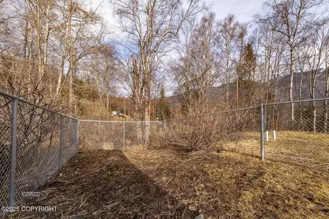 Exterior - 7300 Waterfall Dr, Eagle River, AK 99577 photo 3 of 9