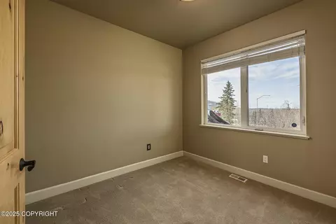 Bedroom - 11268 Sitka Rose Cir, Eagle River, AK 99577 photo 7 of 8