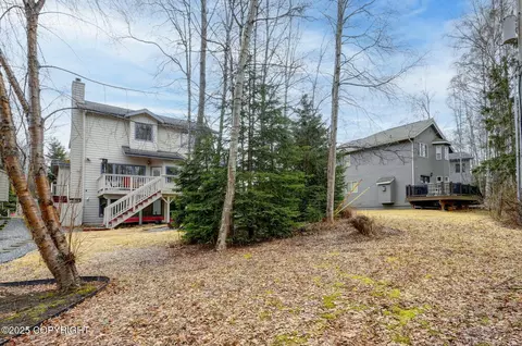Exterior - 7328 Setter Dr, Anchorage, AK 99502 photo 10 of 12