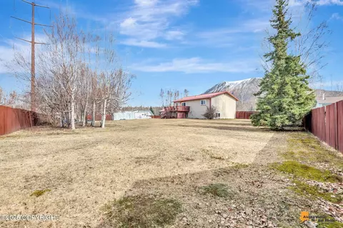 Exterior - 21218 Baron Dr, Chugiak, AK 99567 photo 7 of 13