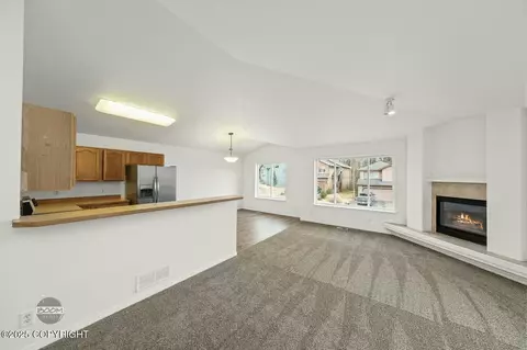 Living - 19449 Highland Ridge Dr, Eagle River, AK 99577 photo 2 of 3
