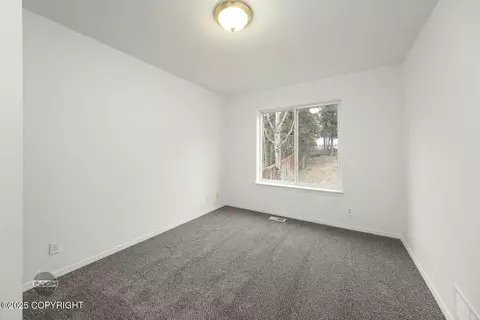 Bedroom - 19449 Highland Ridge Dr, Eagle River, AK 99577 photo 3 of 5