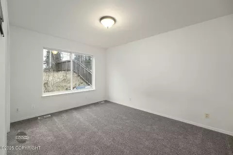 Bedroom - 19449 Highland Ridge Dr, Eagle River, AK 99577 photo 1 of 5