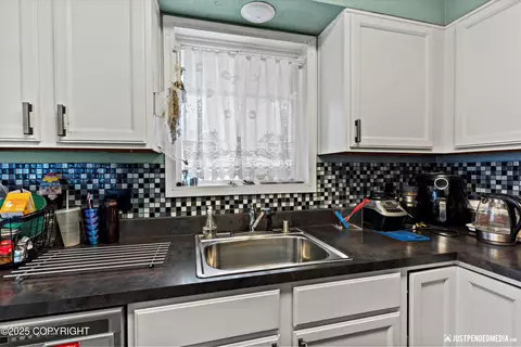 Kitchen - 108 E Cook Ave, Anchorage, AK 99501 photo 2 of 4