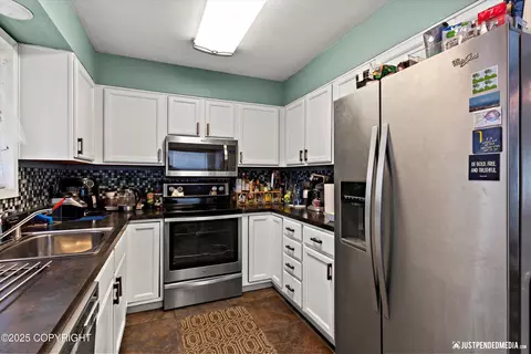 Kitchen - 108 E Cook Ave, Anchorage, AK 99501 photo 1 of 4