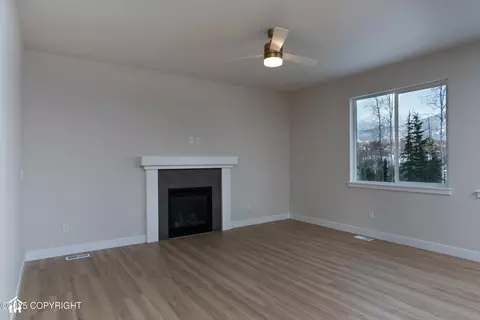 Living - 8787 Turlock Dr, Eagle River, AK 99577 photo 1 of 2