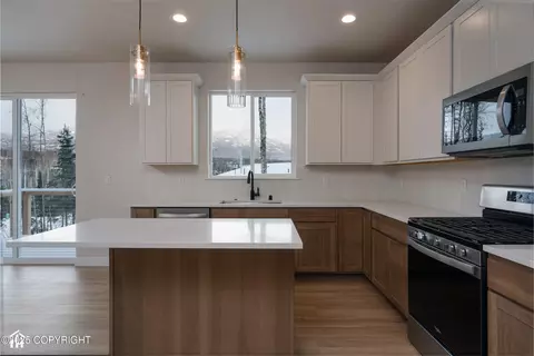 Kitchen - 8787 Turlock Dr, Eagle River, AK 99577 photo 4 of 5