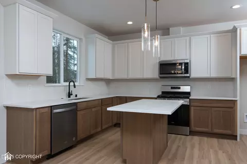 Kitchen - 8787 Turlock Dr, Eagle River, AK 99577 photo 2 of 5