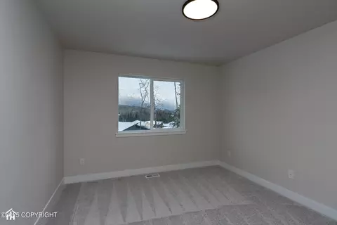 Bedroom - 8787 Turlock Dr, Eagle River, AK 99577 photo 3 of 10
