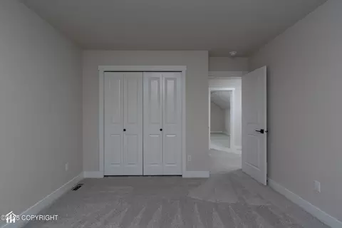 Bedroom - 8787 Turlock Dr, Eagle River, AK 99577 photo 4 of 10