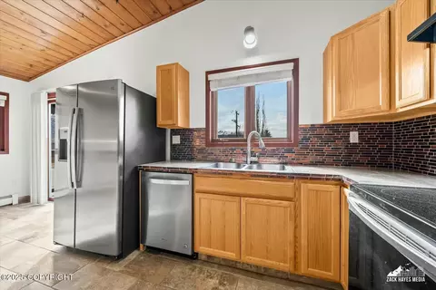 Kitchen - 8023 E 36th Ave, Anchorage, AK 99504 photo 2 of 3