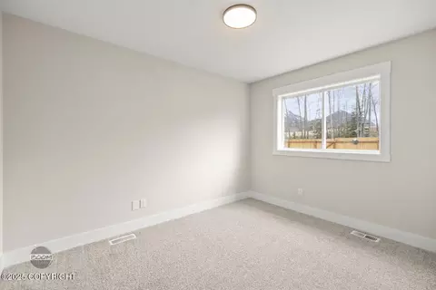 Bedroom - 11933 Town Park Cir, Eagle River, AK 99577 photo 7 of 8
