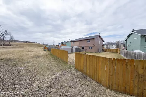 Exterior - 11933 Town Park Cir, Eagle River, AK 99577 photo 8 of 10