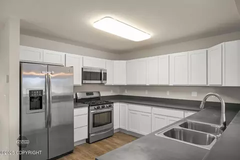 Kitchen - 11933 Town Park Cir, Eagle River, AK 99577 photo 4 of 5