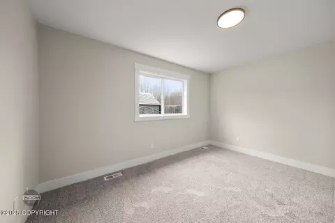 Bedroom - 11933 Town Park Cir, Eagle River, AK 99577 photo 4 of 8