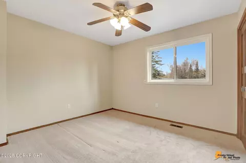 Bedroom - 19717 Delphin Cir, Eagle River, AK 99577 photo 9 of 13