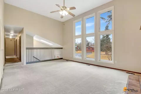 Living - 19717 Delphin Cir, Eagle River, AK 99577 photo 4 of 8