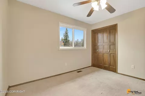 Bedroom - 19717 Delphin Cir, Eagle River, AK 99577 photo 10 of 13