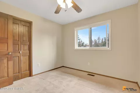 Bedroom - 19717 Delphin Cir, Eagle River, AK 99577 photo 4 of 13
