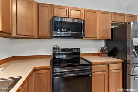Kitchen - 12320 Vista Ridge Loop # 80, Eagle River, AK 99577 photo 3 of 3