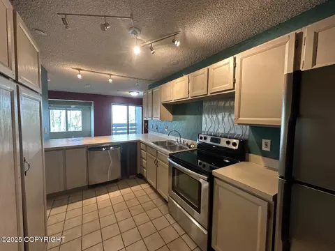 Kitchen - 1210 E 16th Ave # 3, Anchorage, AK 99501 photo 1 of 2