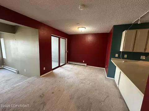 Living - 1210 E 16th Ave # 3, Anchorage, AK 99501 photo 1 of 3