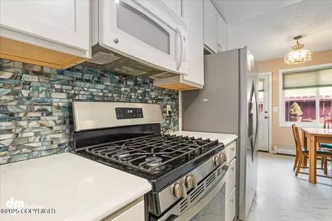 Kitchen - 1920 E 56th Ave, Anchorage, AK 99507 photo 5 of 8