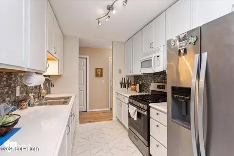 Kitchen - 1920 E 56th Ave, Anchorage, AK 99507 photo 2 of 8