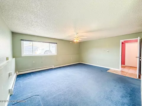 Living - 4849 E 6th Ave, Anchorage, AK 99508 photo 2 of 4