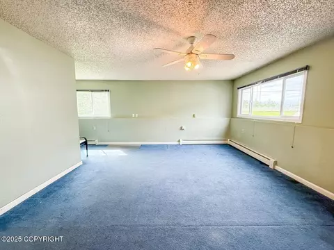 Living - 4849 E 6th Ave, Anchorage, AK 99508 photo 4 of 4