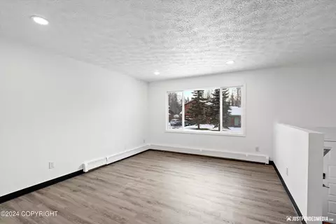 Living - 4011 E 67th Ave, Anchorage, AK 99507 photo 1 of 3
