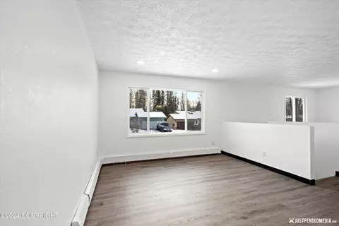 Living - 4011 E 67th Ave, Anchorage, AK 99507 photo 2 of 3