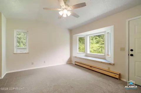 Living - 4477 Panther Dr, Eagle River, AK 99577 photo 1 of 7