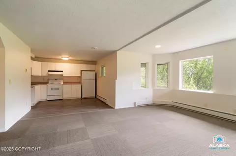 Living - 4477 Panther Dr, Eagle River, AK 99577 photo 6 of 7